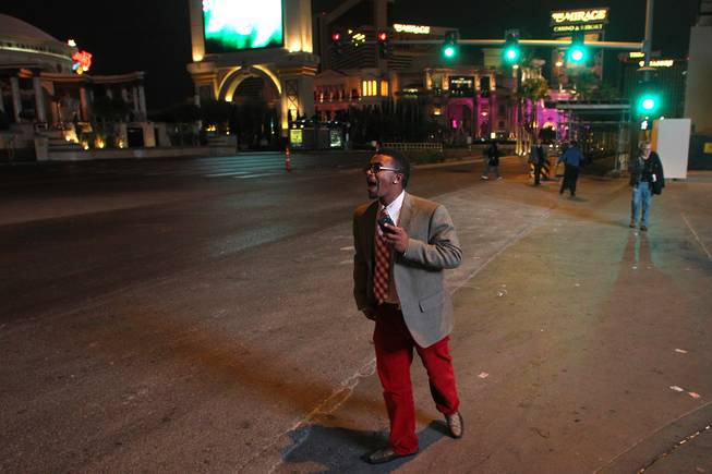 After his amorous entreties were rebuffed, an unidentified man yells back at the woman he tried to pick up on the Strip between 5 a.m. and 6 a.m. Friday, March 8, 2013.