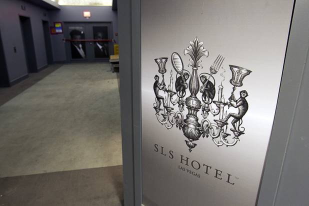 The SLS resort logo is shown on a door during a tour of work on the SLS Las Vegas resort, formerly the Sahara, Wednesday, March 13, 2013. The renovated resort is expected to open in the fall of 2014.