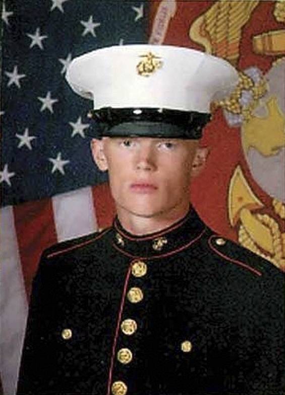 In this undated photo released by the U.S. Marine Corps via the Marietta Times, Marine Lance Cpl. Josh Taylor poses for a photograph. Taylor 21, with the 2nd Marine Expeditionary Force from Camp Lejeune, N.C., was killed with 6 other Marines after mortar shell  exploded during a training exercise at the Hawthorne, Nev., Army Depot.