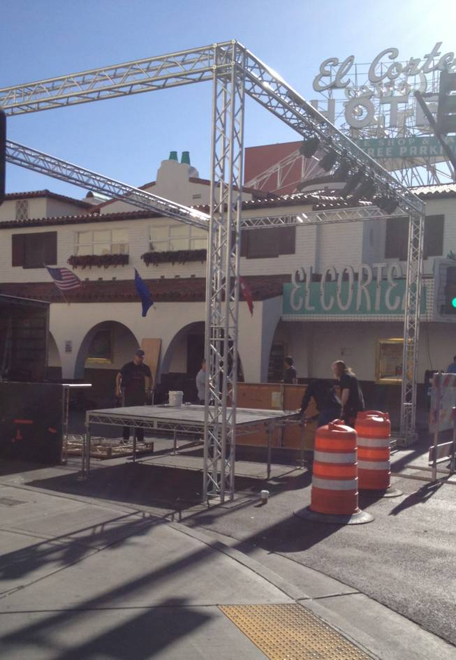 Workers erect a stage Thursday morning at Sixth and Fremont streets, for part of a weekend of events surrounding the Mint 400 off-road race. Streets downtown will be closed for parts of both Thursday and Friday to accommodate the events.