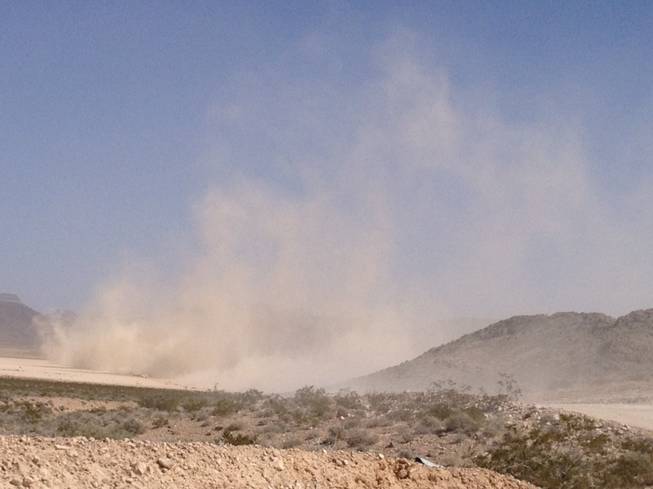 Dust rises from the desert near Las Vegas on Saturday, March 23, 2013, during the Mint 400 off-road race. The race was first run in 1967 and has featured some of the most famous race drivers in history, including Indianapolis 500 drivers Al Unser and Parnelli Jones.