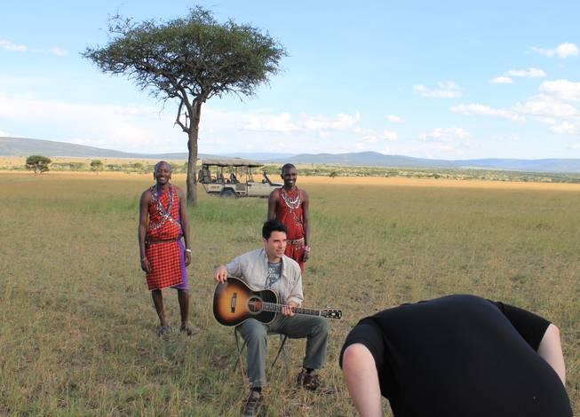 Frankie Moreno and Porini Mara Camp guides Geoffrey Risa Ketere and Ripa Olmara prep for a video being set up by Ricky Moreno in the Ol Kinyei Conservancy in southeastern Kenya. 