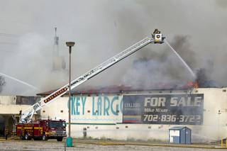 Clark County and City of Las Vegas firefighters battle a four-alarm fire at the old Key Largo Casino on Flamingo Avenue and Paradise Road Thursday, March 28, 2013.