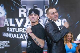 Light welterweight boxers Brandon Rios, left, and Mike Alvarado pose during a final news conference at the Mandalay Bay Thursday, March 28, 2013. The boxers meet for a rematch at the Mandalay Bay Events Center Saturday.