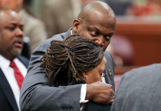 Nevada Assembly Majority Leader William Horne, D-Las Vegas, hugs Assemblywoman Dina Neal, D-North Las Vegas, following an emotional and historic vote to expel fellow Assemblyman Steven Brooks on Thursday, March 28, 2013.