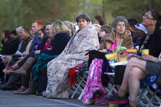 People wait for the start of the 28th annual Easter sunrise service at Palm Eastern Mortuary and Cemetery Sunday, March 31, 2013.