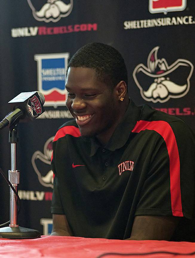 UNLV freshman Anthony Bennett smiles as he recalls his experiences during the past season with his teammates during a press conference on Monday afternoon at UNLV where he announced his intention to enter the NBA draft, April 1, 2013.