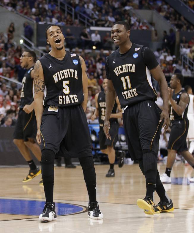 Wichita State guard Demetric Williams, left, celebrates a 3-pointer against Ohio State with teammate Cleanthony Early during the first half of the Shockers' Elite Eight upset against Ohio State on March 30, 2013, in Los Angeles.