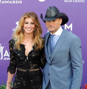 Faith Hill and Tim McGraw arrive at the 2013 Academy of Country Music Awards at MGM Grand Garden Arena on Sunday, April 7, 2013.