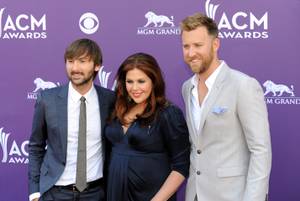 Lady Antebellum -- Dave Haywood, a very pregnant Hillary Scott and Charles Kelley -- arrives at the 2013 Academy of Country Music Awards at MGM Grand Garden Arena on Sunday, April 7, 2013.
