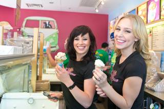 Natalie Walstead and Whitney Giron of X Burlesque hand out ice cream at Ben & Jerry's in The District at Green Valley Ranch during 
