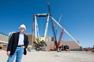 Eric Eberhart, general manager of the High Roller, stands in the foreground of the ongoing construction site of the 500-foot Observation Wheel at The Linq Friday, April 12, 2013.