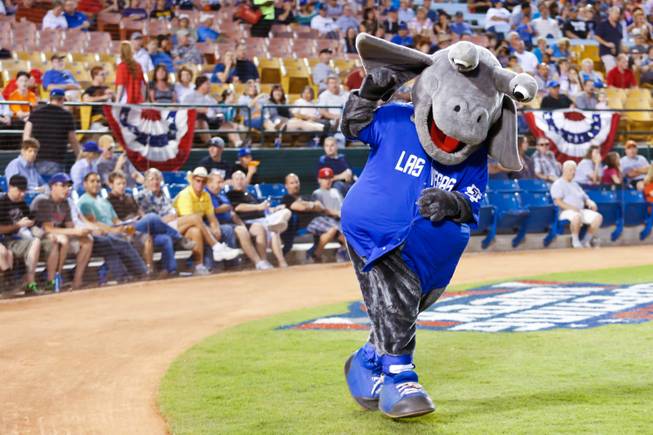 Las Vegas 51's mascot Cosmo takes the field, Friday April 12, 2013.