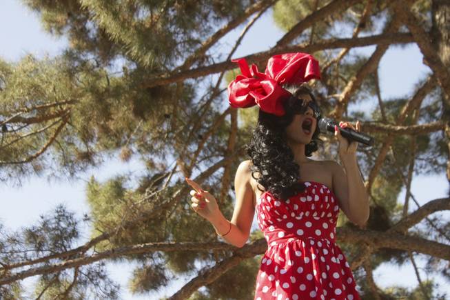 Melody Sweets from the Strip show "Absinthe" performs during the 2013 Aids Walk held at UNLV, Sunday, April 13, 2013.
