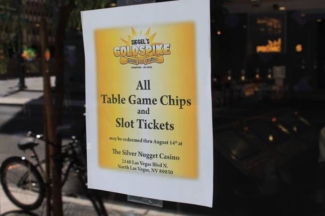 A sign on the door directs gamblers on where to cash in chips and tickets fro the Gold Spike.