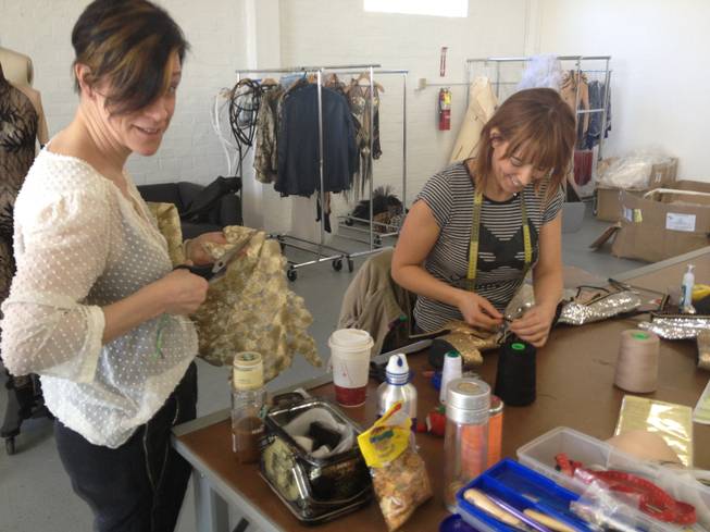 Costume designer Marie-Chantale Vaillancourt, left, and Genevieve Maranda work on costumes for Cirque du Soliel performers. A group of Cirque costume designers and seamstresses are stitching and sewing, measuring and adjusting costumes in the Stitch Factory, a co-working space for designers that is equipped with industrial machines, dress forms and working tables