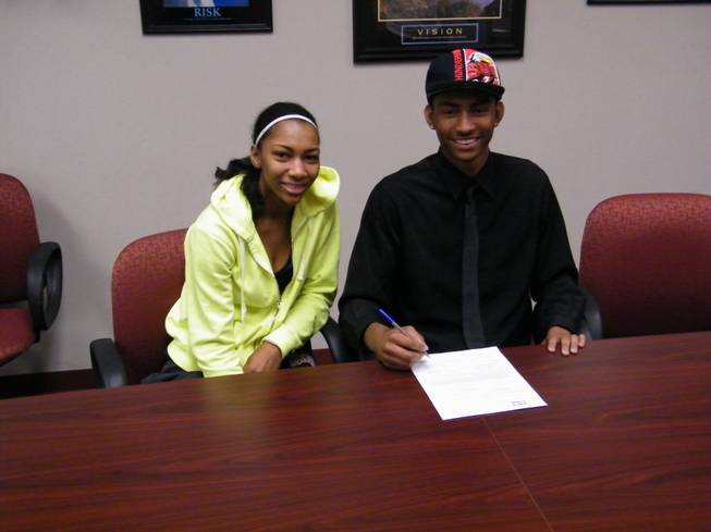 Las Vegas High basketball player Juwan Major signs a letter-of-intent with Southern Utah alongside his twin sister, Diamond Major.