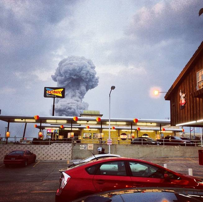 In this Instagram photo provided by Andy Bartee, a plume of smoke rises from a fertilizer plant fire in West, Texas on Wednesday, April 17, 2013. An explosion at a fertilizer plant near Waco Wednesday night injured dozens of people and sent flames shooting high into the night sky, leaving the factory a smoldering ruin and causing major damage to surrounding buildings.