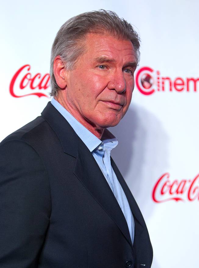 Actor Harrison Ford, recipient of the Lifetime Achievement Award, arrives at the CinemaCon awards ceremony at Caesars Palace Thursday, April 18, 2013. CinemaCon is the official convention of the National Association of Theatre Owners.