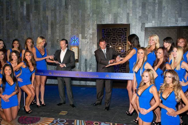 Neil Moffitt, CEO of Angel Management Group, and Scott Sibella, president and COO of MGM Grand, celebrate the opening of Hakkasan Las Vegas with a ceremonial ribbon cutting Thursday, April 18, 2013.