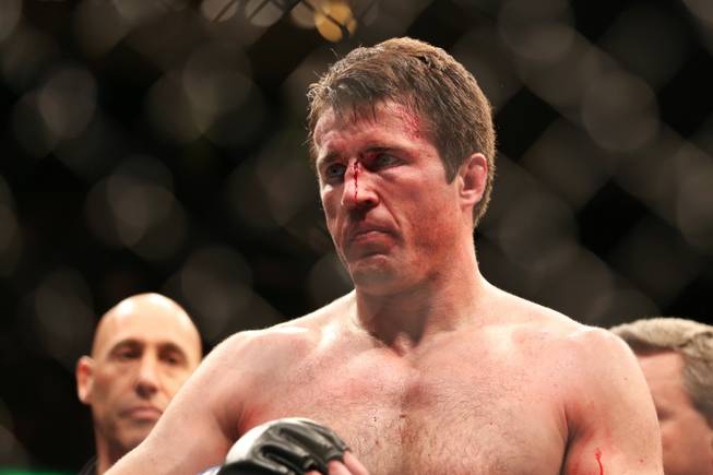 A defeated Chael Sonnen is seen after losing to champion Jon Jones in their UFC 159 light heavyweight title bout in Newark, N.J., Saturday, April 27, 2013. Jones retained his title via first-round TKO.