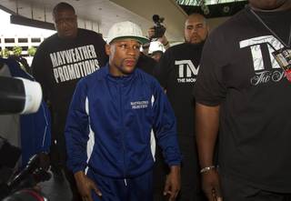 Undefeated welterweight boxer Floyd Mayweather Jr. makes his official arrival at the MGM Grand Tuesday, April 30, 2013. Mayweather will defend his WBC welterweight title against Robert Guerrero at the MGM Grand Garden Arena on Saturday.