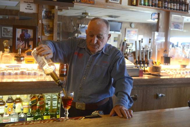 Bruno Selmi makes a Picon Punch behind the bar Bruno's Country Club in Gerlach, Nev.  
