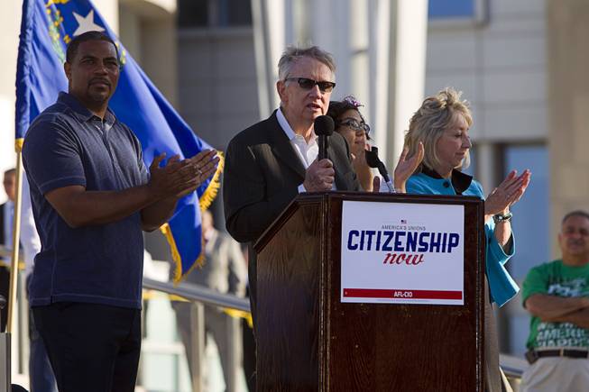 Senate Majority Leader Harry Reid (D-NV) is joined by Congressman Steven Horsford, left, and Congresswoman Dina Titus as he speaks during a May Day rally for comprehensive immigration reform in downtown Las Vegas Wednesday, May 1, 2013. The event started at the George Federal Building downtown, then marchers traveled south on Las Vegas Boulevard, finishing with a rally at St. Louis Square near the Stratosphere.