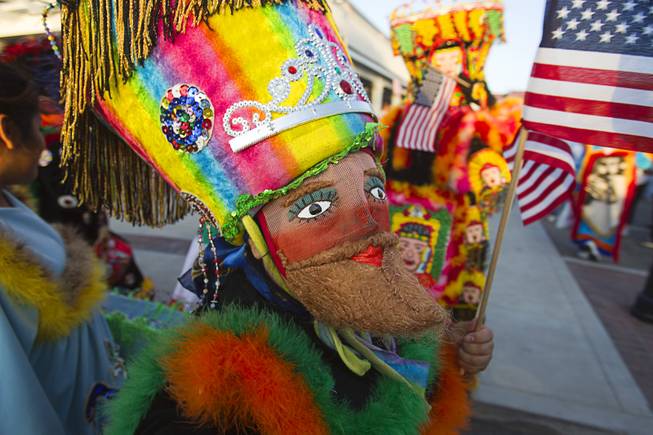 A costumed marcher participates in a May Day rally and march for comprehensive immigration reform Wednesday, May 1, 2013. The event started at the George Federal Building downtown, then marchers traveled south on Las Vegas Boulevard, finishing with a rally at St. Louis Square near the Stratosphere.