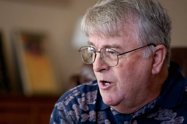Larry Brown, who strongly opposes immigration reform and "amnesty" for illegal immigrants and believes his identity and Social Security number were stolen by an illegal immigrant, expresses his opinion in his home in North Las Vegas Tuesday, April 30, 2013.