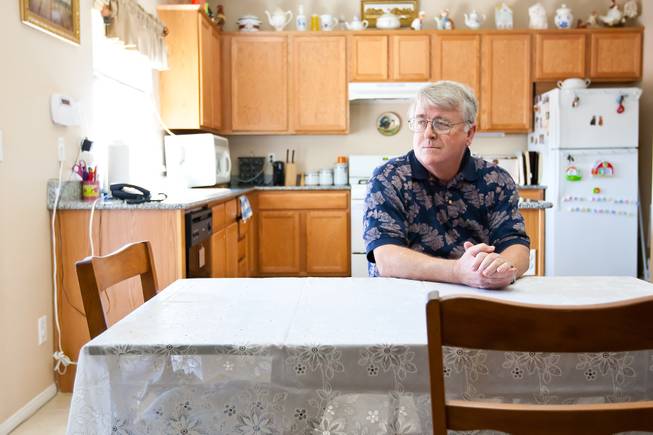 Larry Brown, who strongly opposes immigration reform and "amnesty" for illegal immigrants and believes his identity and Social Security number were stolen by an illegal immigrant, sits frustrated at the government in his home in North Las Vegas Tuesday, April 30, 2013.