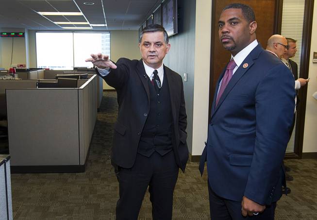 Capt. Al Salinas, left, gives a tour of the Southern Nevada Counter-Terrorism Center, also known as the Fusion Center, to Congressman Steven Horsford (D-NV) at Metro Police Headquarters Thursday, May 2, 2013. Officials at the center are concerned that budget cuts that might negatively affect its operations.