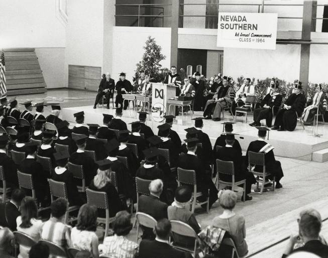 Nevada Gov. Grant Sawyer addresses the first graduating class at commencement in 1964, when UNLV was known as Nevada Southern University. 29 students graduated at the first commencement ceremony. (UNLV Special Collections)