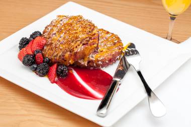 Caribbean French Toast made with piña colada mix, fresh shaved coconut and served with a raspberry coulis and fresh berries will be served for Mother’s Day at Central Michel Richard at Caesars Palace.