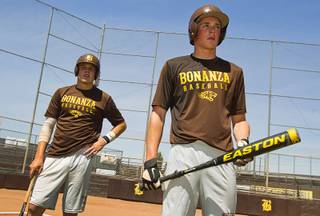 Brett Doyle, left, and Chris Dunn wait for a turn at bat during practice at Bonanza High School Monday, May 13, 2013. Bonanza is the surprise team in the state tournament, upsetting the seven-time state champion Bishop Gorman High School twice in last week's double elimination Sunset Regional event.