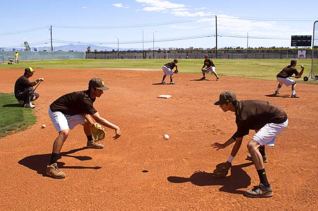 Players run a drill during practice at Bonanza High School Monday, May 13, 2013. Bonanza is the surprise team in the state tournament, upsetting the seven-time state champion Bishop Gorman High School twice in last week's double elimination Sunset Regional event.