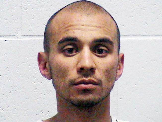 This image provided by Lyon County Sheriff’s Office shows Jeremiah Bean, a 25-year-old person of interest who has been arrested after five people were found dead in one morning in northern Nevada. Bean was arrested Monday, April 13, 2013, on suspicion of burglary after he was found with items from one of the crime scenes.