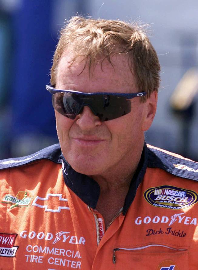 In this June 4, 1999, file photo, NASCAR driver Dick Trickle speaks to fans after qualifying on the pole position in the NASCAR Busch series auto race at Dover Downs in Dover, Del. Authorities in North Carolina said Thursday, May 16, 2013, that Trickle died of an apparent self-inflicted gunshot wound. He was 71.