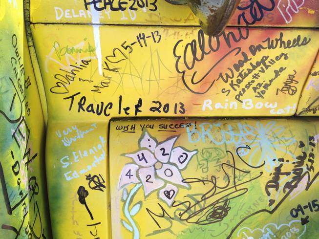 A closeup of the writings and drawings on Donny "Skyy" Squires' the "Magic Jukebox" bus, Tuesday, May 28, 2013.