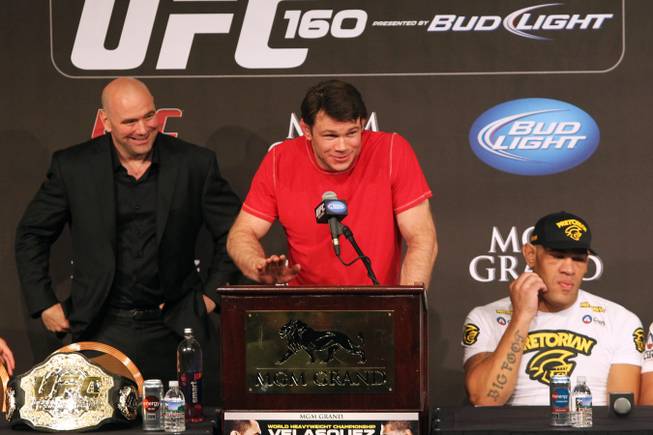 Forrest Griffin announces his retirement after UFC 160 Saturday, May 25, 2013 at the MGM Grand Garden Arena. On the left is UFC president Dana White and on the right is heavyweight Antonio "Bigfoot" Silva.