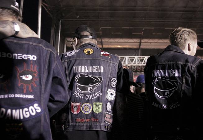Turbonegro fans wear custom made jackets with the bands logo during the Punk Rock Bowling & Music Festival, Sunday, May 26, 2013.