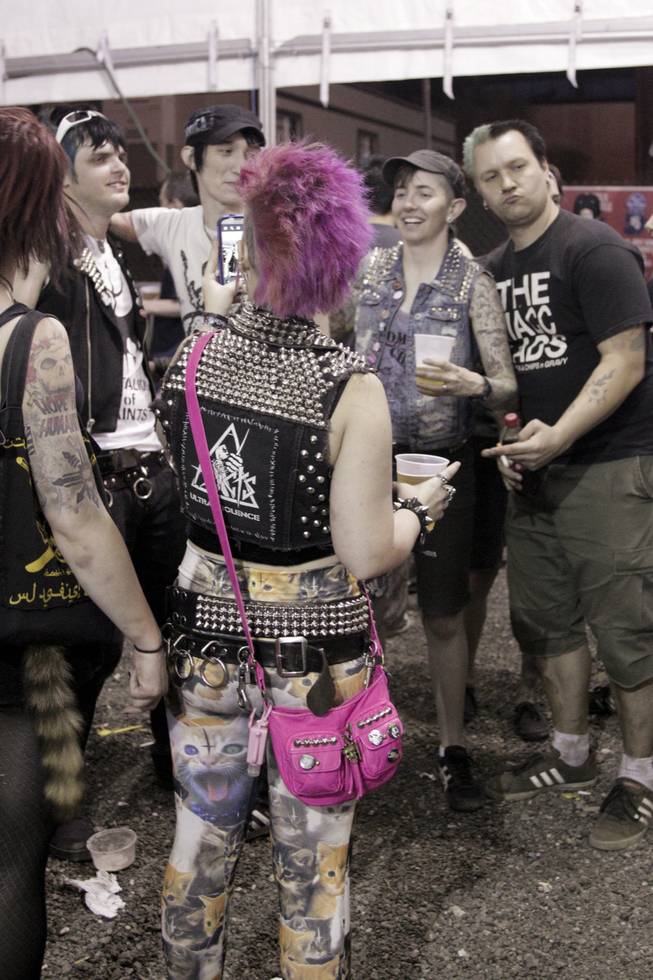 Fans hang out in the beer canopy during Punk Rock Bowling & Music Festival, Sunday, May 26, 2013.