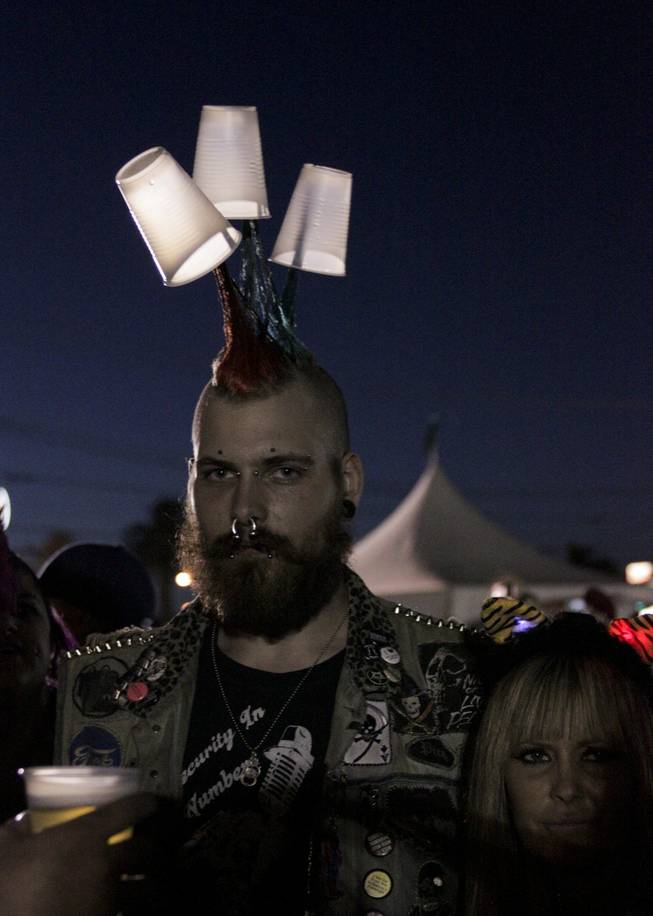 A fan customized his mohawk with empty plastic beer cups at the Punk Rock Bowling & Music Festival, Sunday, May 26, 2013