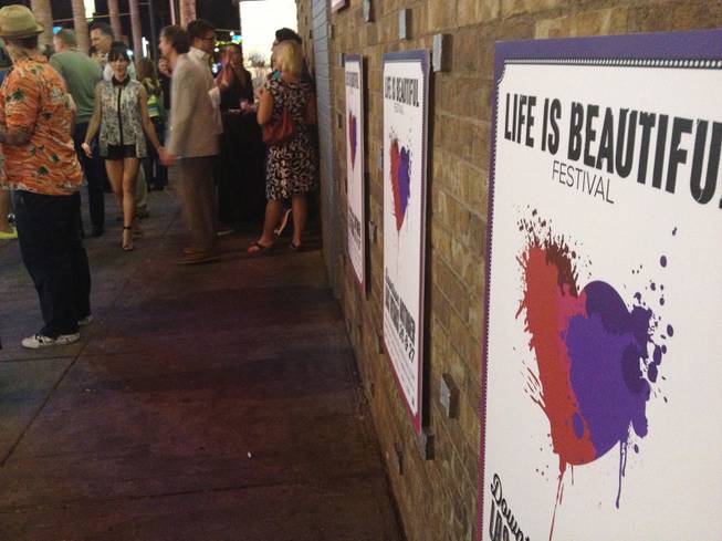 Posters for the Life Is Beautiful festival are shown outside Fremont Country Club, where the October event's music lineup was announced Monday, June 3, 2013.
