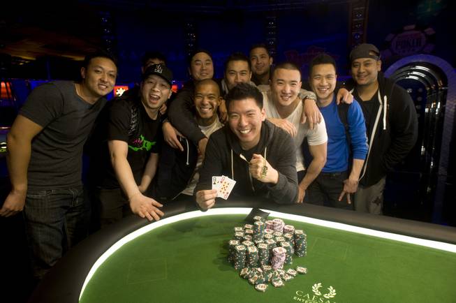 Benny Chen poses with his friends after winning the 2013 World Series of Poker Millionaire Maker tournament at the Rio on June 4, 2013.