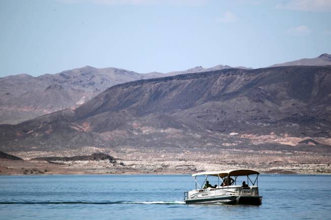 A pontoon boat is seen on Lake Mead Thursday, June 6, 2013.