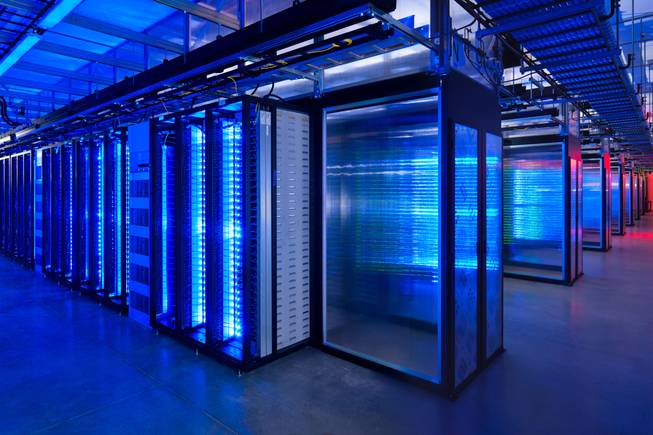 This undated photo provided by Facebook shows the server room at the company's data center in Prineville, Ore. The revelations that the National Security Agency is perusing millions of U.S. customer phone records at Verizon and snooping on the digital communications stored by nine major Internet services illustrate how aggressively personal data is being collected and analyzed.