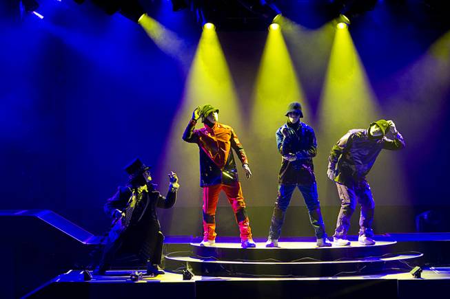 Jabbawockeez cast members perform in "Prism," their new show at the Luxor, Sunday, June 9, 2013.