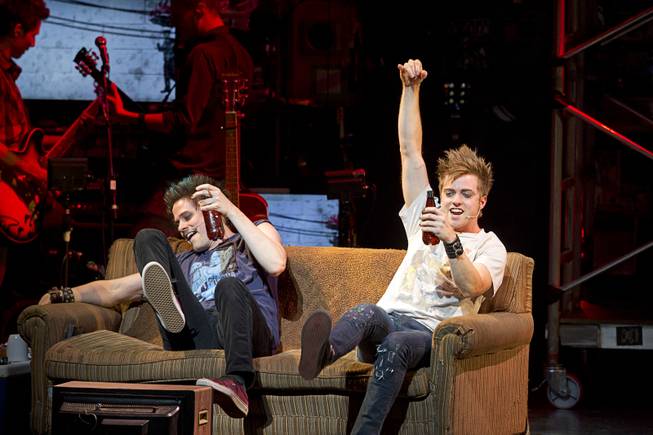 Will, left (played by Casey O'Farrell) and Johnny (played by Alex Nee) during "American Idiot" at the Smith Center for the Performing Arts Tuesday, June 11, 2013. American Idiot, featuring music by Green Day, tells the story of three lifelong friends forced to choose between their dreams and the safety of suburbia.