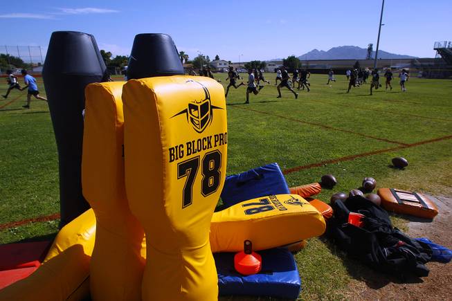 New blocking dummies sit on the edge of the practice field at Chaparral courtesy of an anonymous donor Tuesday, June 11, 2013.